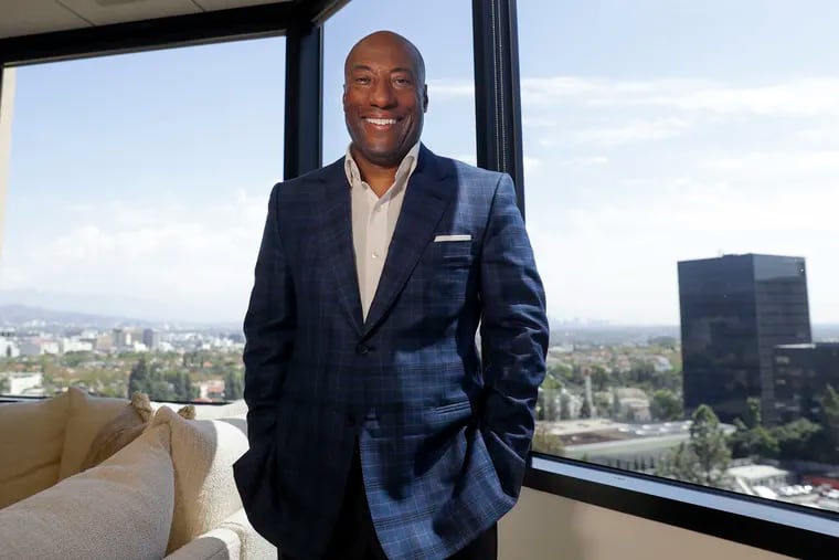 FILE - In this Sept. 5, 2019 file photo, comedian and media mogul Byron Allen poses for a picture Thursday, Sept. 5, 2019, in Los Angeles. The Supreme Court has thrown out a lower court ruling in favor of a black media mogul and comedian who’s suing cable giant Comcast for racial discrimination. The justices agreed unanimously Monday that an appeals court applied the wrong legal standard in allowing business owner Byron Allen’s $20 billion lawsuit against Comcast to go forward.(AP Photo/Chris Carlson)