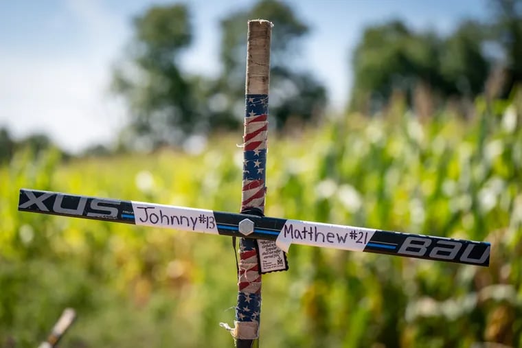 A memorial for brothers Johnny and Matthew Gaudreau where the accident happened in Salem County.