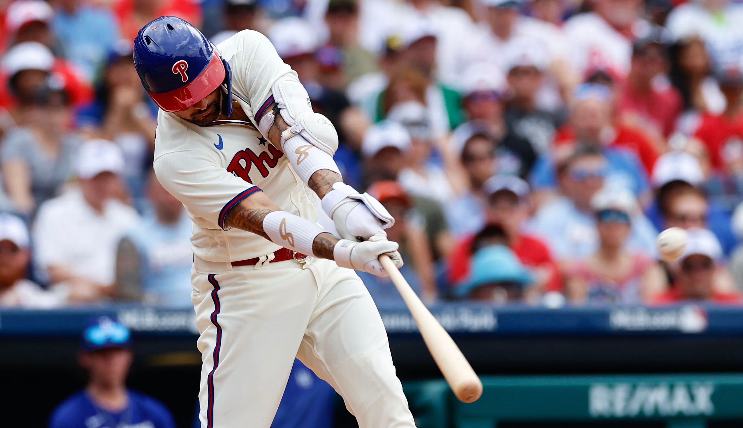 Big bats help Phillies out-pace blunders and bullpen woes in