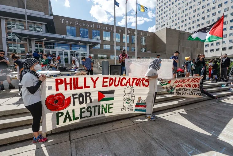 Pro-Palestinian teachers rally outside the Philadelphia School District headquarters on Thursday.