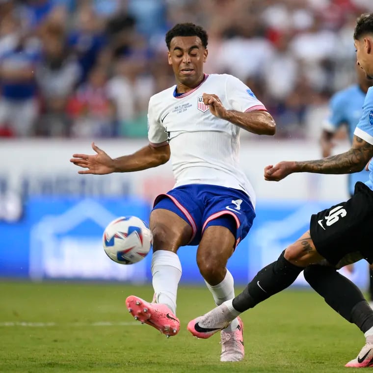 Tyler Adams of the United States (left) and Uruguay's Mathias Olivera battle for the ball during a Copa America match on Monday in Kansas City, Mo.
