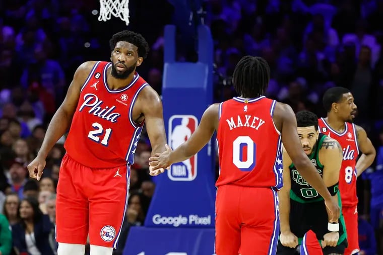 Sixers center Joel Embiid with Tyrese Maxey during Game 3 of the Eastern Conference semifinals against the Boston Celtics.