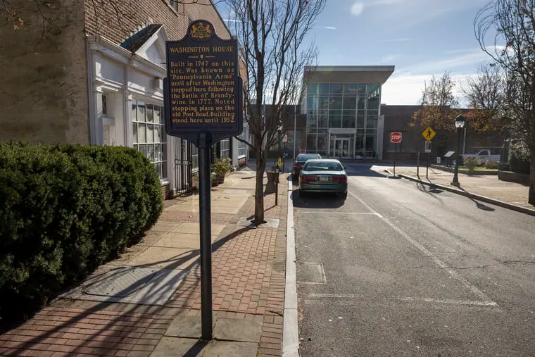 A historic marker for the  Washington House in downtown Chester with City Hall in the background. The bankrupcty receiver says that without the sale of water assets, the city won't be able to provide basic services.