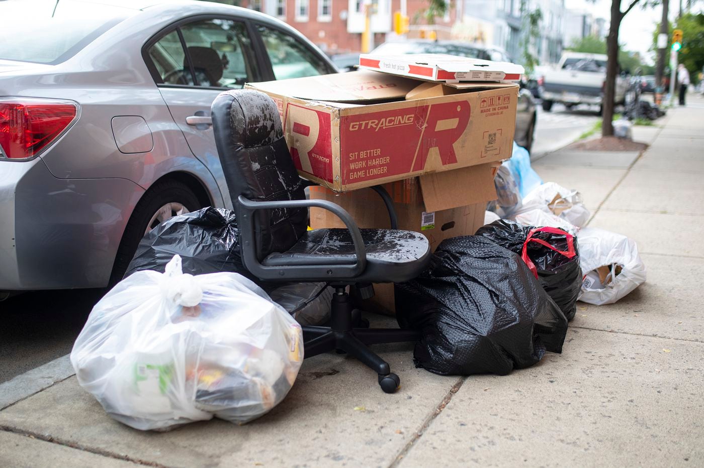 Philly asks residents to put trash out a day later as it catches up on