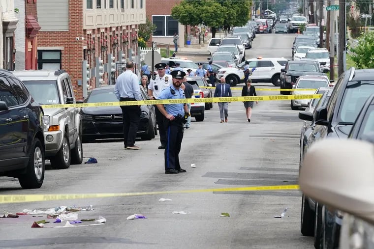 The scene on West Venango Street between 16th and 18th Streets, where an FBI agent shot a man while serving a search warrant on Aug. 4.