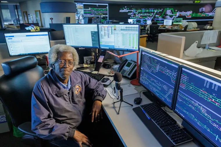 Alvin Elliott keeps Regional Rail commuters informed from his desk at the SEPTA's headquarters on 1234 Market St.