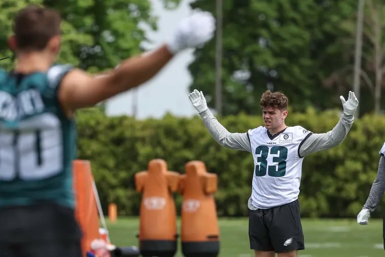 Eagles rookie and second-round draft pick Cooper DeJean warms up during rookie minicamp at the NovaCare Complex in Philadelphia on Friday, May 3, 2024.