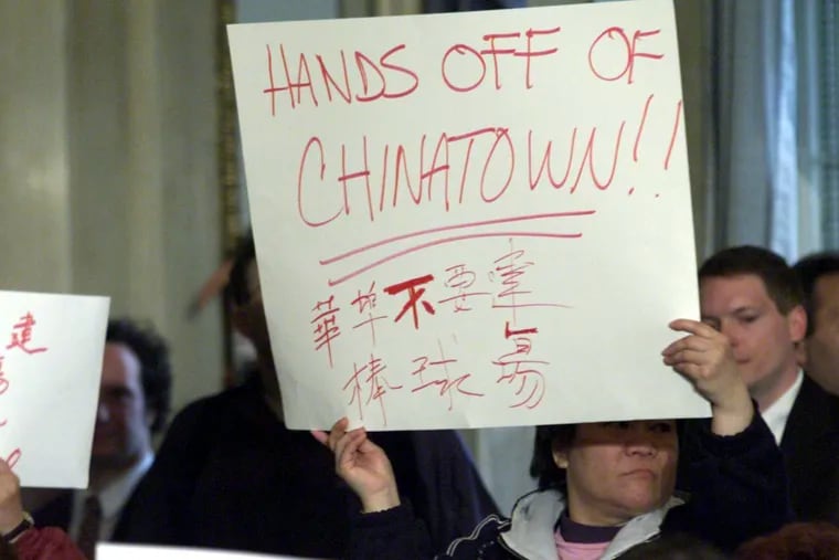 A Chinatown resident protests a proposed Phillies stadium in the neighborhood in 2000.