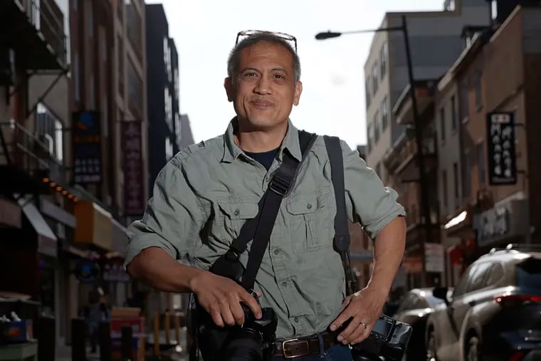 Photographer Rodney Atienza was photographed in the Chinatown section of Phila., Pa. on Thurs. May 18, 2023.