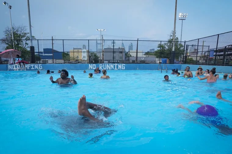 Visitors swim in the pool at Chew Recreation Center, in Philadelphia, July 16  2024. .Philadelphia Parks and Recreation Center Pools are open 11am to 7pm free swim Monday through Friday, on days like today when a code red is declared, which is three or more consecutive days of 90 degrees. On the weekends every weekend 12-5 free swim, until sometime in late august. Visitors must have proper swim gear, capacity is limited to a lifeguard ratio of 30 to one, those visitors who would like to avoid waiting in line on hot or busy days may consider arriving earlier in the day.  On regular swim days, non code red days, the hours are 1-4 free swim, 4-5 swim lessons, 5-7 family swim, schedule may vary depending on location.