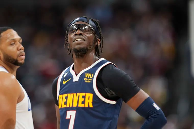 Denver Nuggets guard Reggie Jackson looks on during a break in the action in the second half of an NBA basketball game against the Los Angeles Clippers Sunday, Feb. 26, 2023, in Denver.