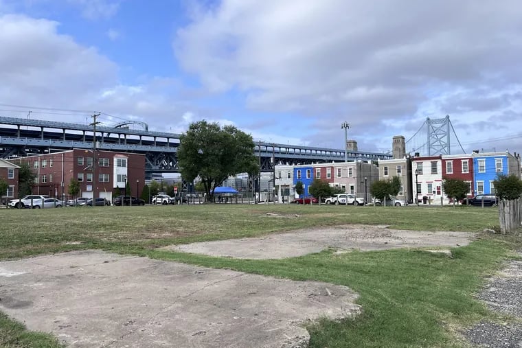 A view of the site of the former West Jersey Paper manufacturing site in North Camden, in the shadow of the Ben Franklin Bridge. The U.S. Environmental Protection Agency announced a $1 million grant August 29, 2024 to the nonprofit Camden Lutheran Housing Inc. for cleanup of the contamination of the property, which will become 15 affordable single family homes.