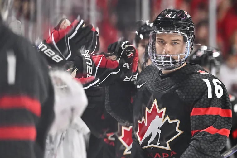 HALIFAX, CANADA - JANUARY 02: Connor Bedard #16 of Team Canada celebrates his goal with teammates on the bench during the first period against Team Slovakia in the quarterfinals of the 2023 IIHF World Junior Championship at Scotiabank Centre on January 2, 2023 in Halifax, Nova Scotia, Canada. (Photo by Minas Panagiotakis/Getty Images)