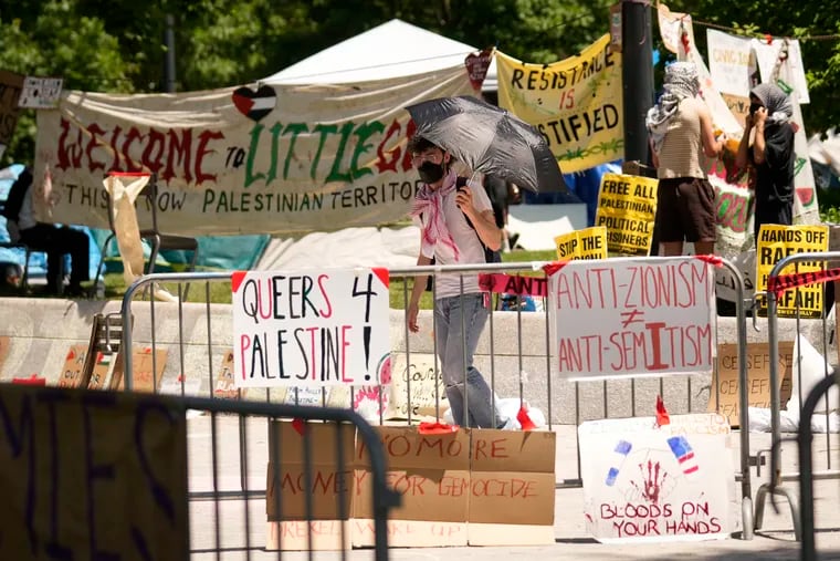 Tents and pro-Palestinian protesters occupy a quad at Drexel University in May.