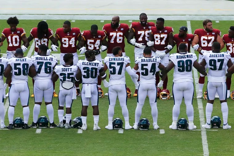 Malik Jackson says the Eagles wanted to kneel during Sunday's opening  kickoff, but Washington players declined