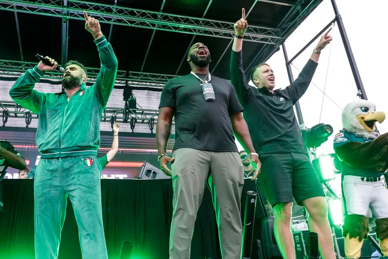 Jason Kelce (left), Fletcher Cox (center), and Nick Foles appear on stage at Xfinity Live! as part of ESPN's "Monday Night Football" coverage.