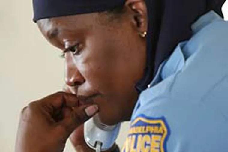A court ruled Wednesday that Philadelphia police officer Kimberlie Webb can not wear her Muslim head scarf while on duty. (John Costello / Staff File Photo)