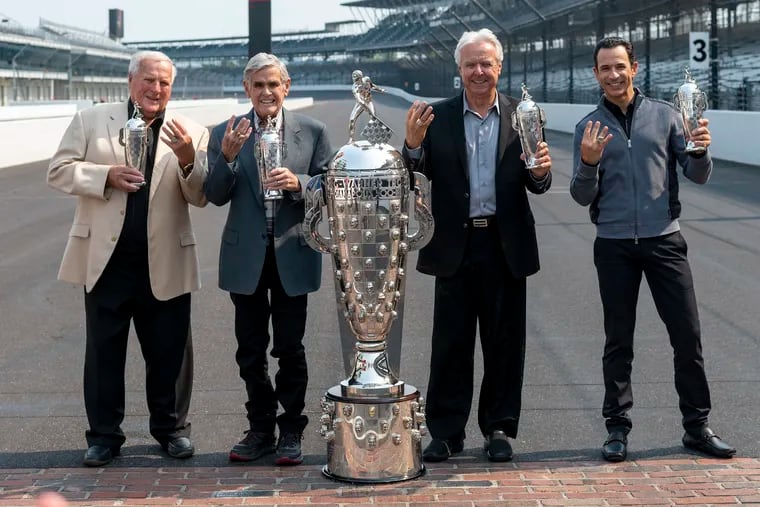 Winner of the 2021 Indy 500, Helio Castroneves, right, gathered with other four-time winners, from left, A.J. Foyt (1961, 1964, 1967, 1977), Al Unser (1970, 1971, 1978, 1987) and Rick Mears (1979, 1984, 1988, 1991) at the Indianapolis Motor Speedway in Indianapolis, Tuesday, July 20, 2021. Castroneves won the race in 2001, 2002, 2009 and 2021. Unser, one of only four drivers to win the Indianapolis 500 a record four times, died Thursday, Dec. 9, 2021, following years of health issues. He was 82.