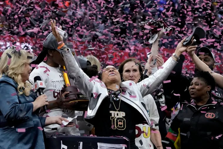 South Carolina coach Dawn Staley basks in the celebration after the Gamecocks beat Iowa, 87-75.