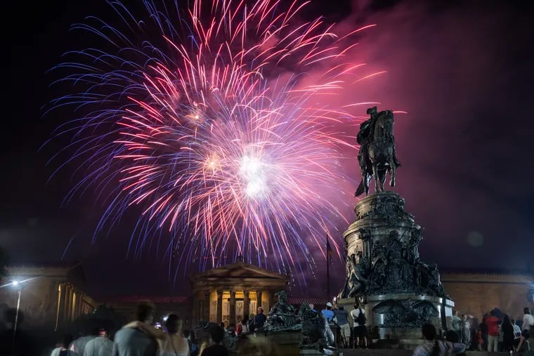 Fireworks over the Philadelphia Museum of Art and the statue of George Washington at Eakins Oval during the 2023 Wawa Welcome America Festival.