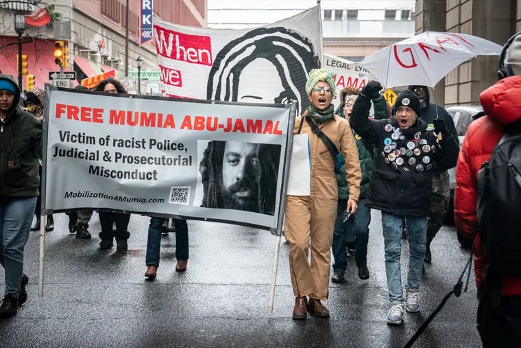 Supporters of Mumia Abu-Jamal outside the Juanita Kidd Stout Center for Criminal Justice on Dec. 16.