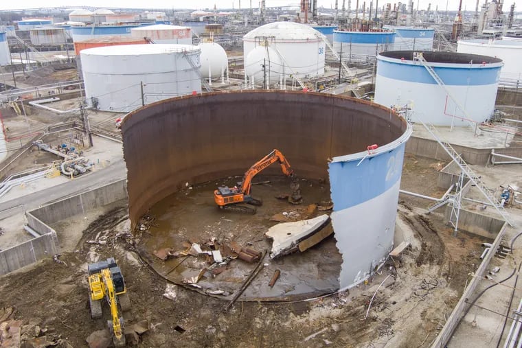 Work on the former PES Refinery in South Philadelphia in 2021. Hilco has dismantled all of the old fuel tanks, and on Tuesday broke ground on its first new building.