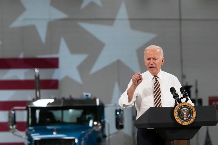 President Joe Biden speaks at the Mack Truck Lehigh Valley Operations in Macungie, Pa. Wednesday. Pennsylvania and New Jersey Democrats are counting on his infrastructure plan as a key selling point in next year's elections. Republicans blame the spending for rising inflation.