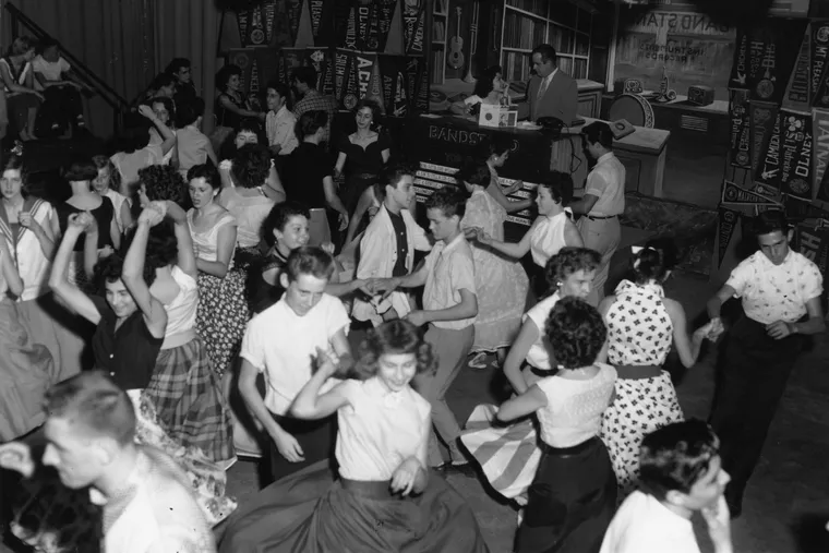 Teenagers dancing on the television show 'Bandstand' in July 1955. Bob Horn, host, talks to a young woman in the background.