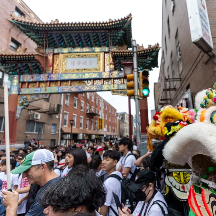 A Chinese lion performer near the Chinatown Friendship Gate during the rally and march for the 'No Arena In The Heart of Our City' demonstration.