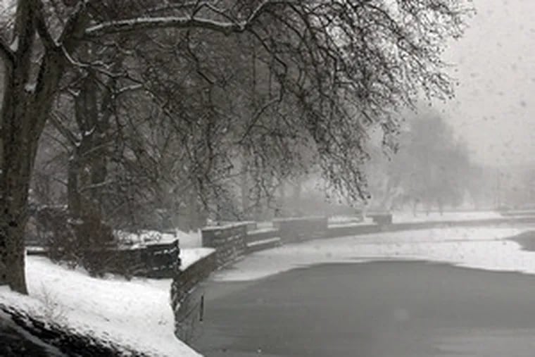 Snow falling on the Schuylkill in February 2003. True white Christmases have been rare since &#0039;66.