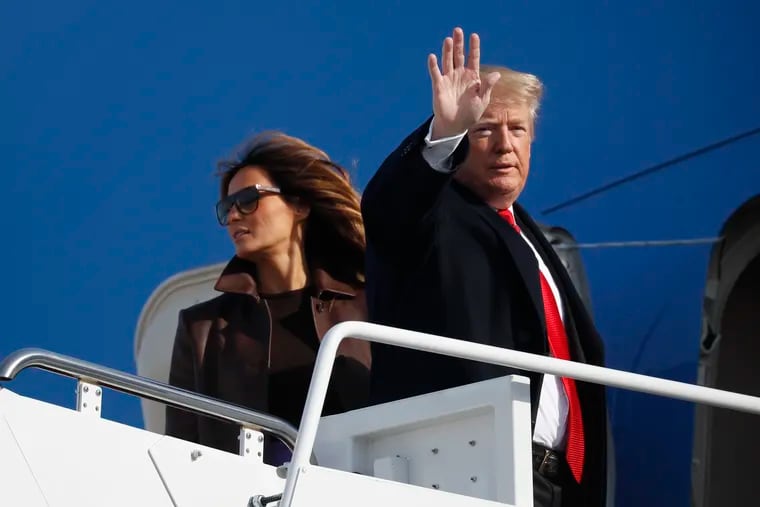 President Donald Trump and first lady Melania Trump board Air Force One, Thursday, Nov. 29, 2018 at Andrews Air Force Base, Md. Trump is traveling to Argentina to attend the G20 summit. (AP Photo/Pablo Martinez Monsivais)