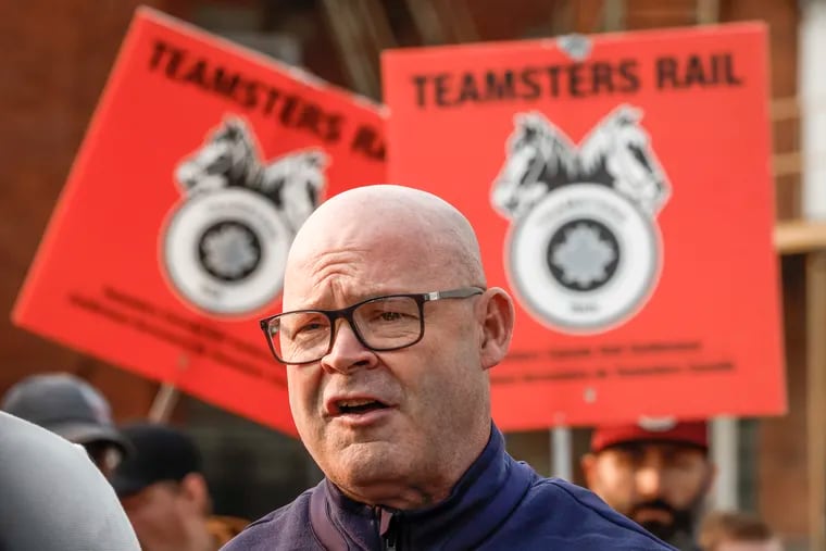 Sean O'Brien, General President, International Brotherhood of Teamsters, speaks to media as picketing rail workers gather at the CPKC headquarters in Calgary, Alta., in August.