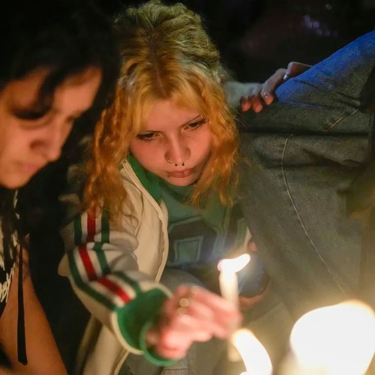 Fans light candles outside the hotel where former One Direction singer Liam Payne was found dead after he fell from a balcony in Buenos Aires, Argentina, on Wednesday, Oct. 16, 2024.