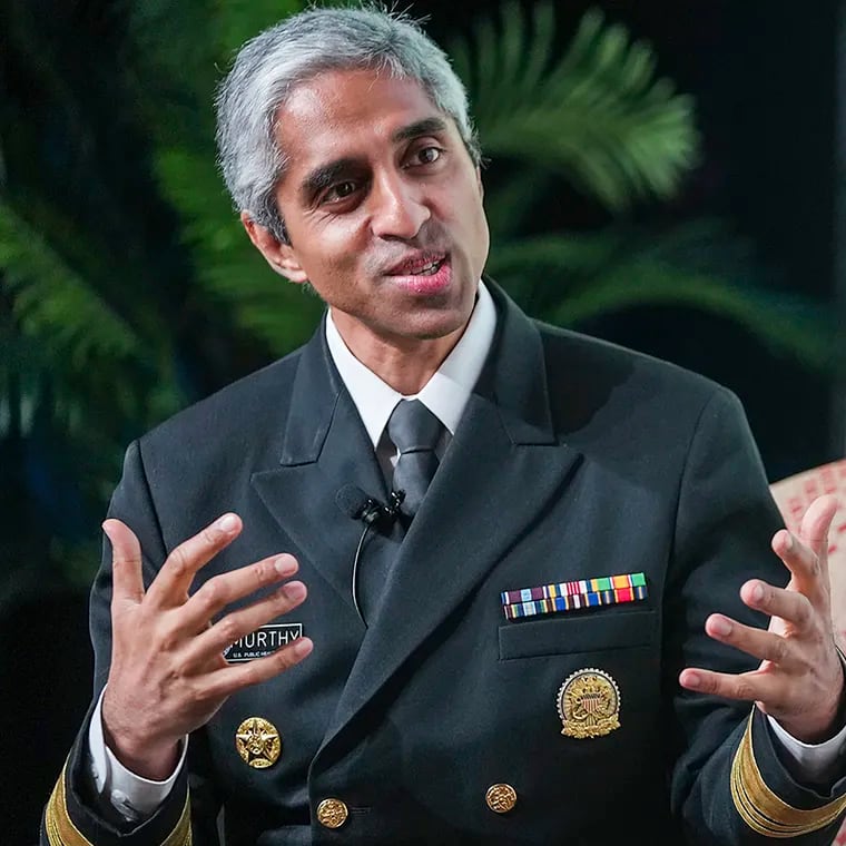 FILE - United States Surgeon General Dr. Vivek Murthy discusses the importance of social connection to our mental and physical well-being with Matthew McConaughey, obscured at right, Wednesday, Nov. 8, 2023, in Austin, Texas. The U.S. surgeon general has called on Congress to require warning labels on social media platforms similar to those now mandatory on cigarette boxes. In a Monday, June 17, 2024, opinion piece in the The New York Times, Dr. Vivek Murthy said that social media is a contributing factor in the mental health crisis among young people.(Ricardo B. Brazziell/Austin American-Statesman via AP, File)