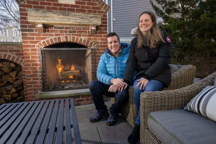 "We love to cook and be outdoors all year round,” says Dan Bills, who with his wife, Emily, added an outdoor kitchen and fireplace to their home in Haddonfield.