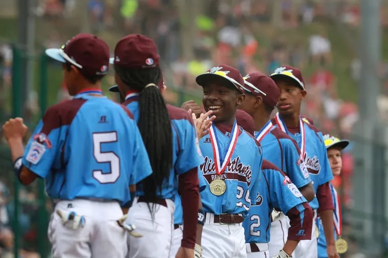 Taney Dragons' Zion Spearman is all smiles at the Little League World Series in South Williamsport, Pa., Friday August 15, 2014. ( DAVID SWANSON / Staff Photographer )