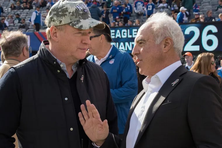 Eagles owner Jeffrey Lurie (right) and NFL Commissioner Roger Goodell talk before the game against the Giants at MetLife Stadium November 6, 2016. CLEM MURRAY / Staff Photographer