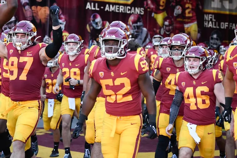 Action Network Use Only - LOS ANGELES, CA - OCTOBER 9: USC Trojans players take the field before a college football game against the Utah Utes at Los Angeles Memorial Coliseum October 9, 2021 in Los Angeles, California.  (Photo by Denis Poroy/Getty Images)