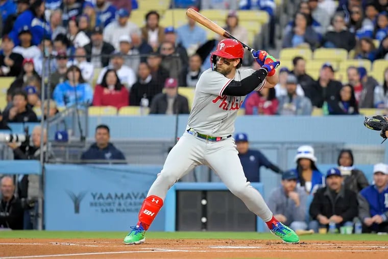 Bryce Harper returns, but the Phillies' bats go quiet in a 13-1 drubbing by  the Dodgers