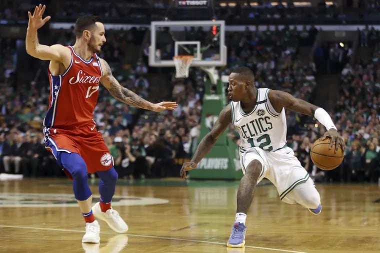 Boston Celtics guard Terry Rozier makes a move against the Sixers’ JJ Redick in the second half of Game 1 of the Eastern Conference Semifinals Monday night. The Sixers lost, 117-101.