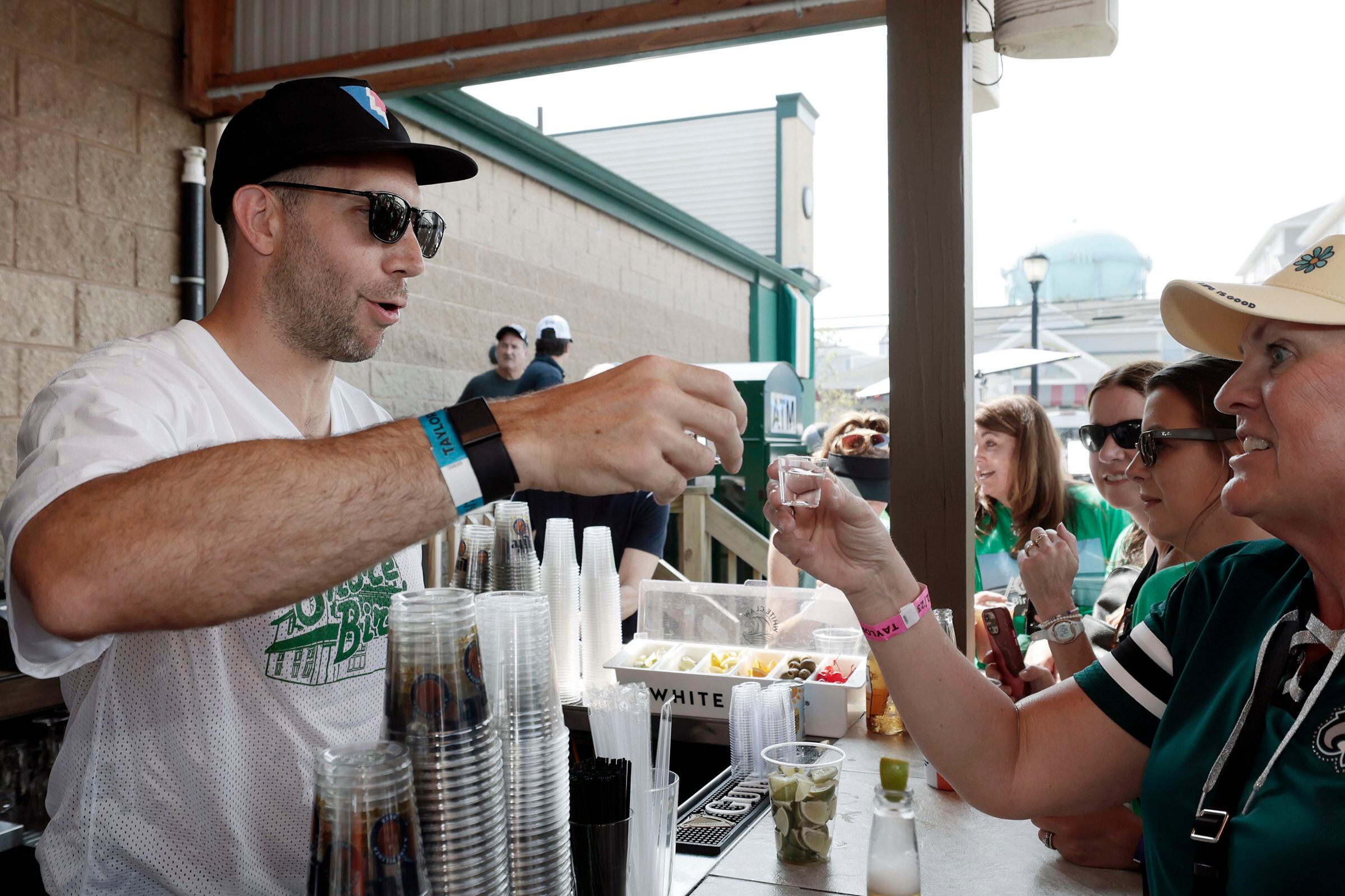 Kelce Chugs 5-Second Beer, Pours Shots For Good Cause At Sea Isle Bar