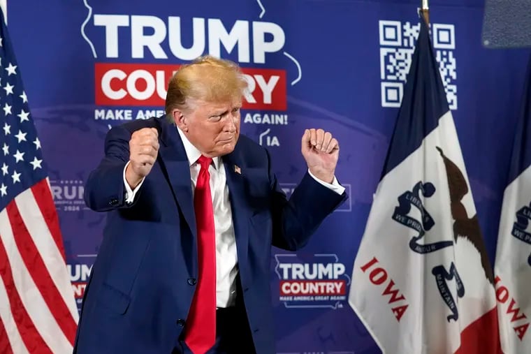 Former President Donald Trump dances after speaking at a campaign rally at Terrace View Event Center in Sioux Center, Iowa, in January.