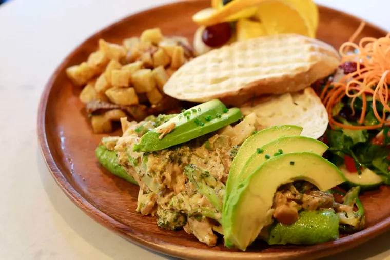 Lyonnaise omelet is topped with avocado at Cafe La Maude. DAVID SWANSON /Staff Photographer