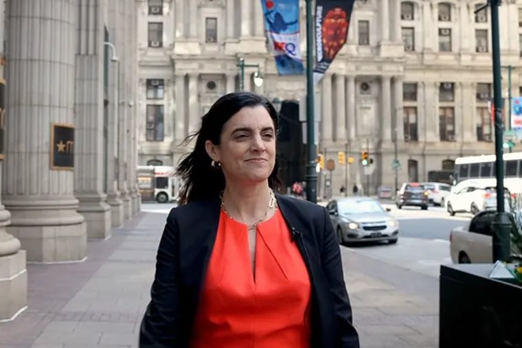 Mayoral candidate Rebecca Rhynhart walks in Center City. The former city controller is the best choice for voters in the Democratic primary.