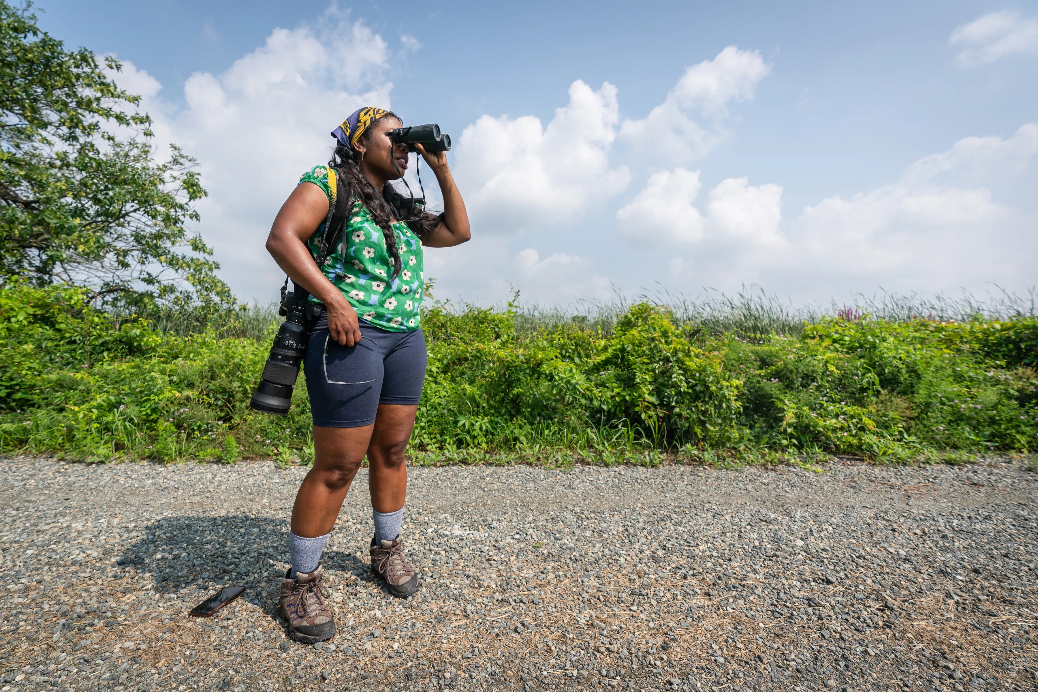 When Christy Hyman's son passed away, she turned to birding to find solace. She is shown here birding at John Heinz National Wildlife Refuge on July 20, 2023.