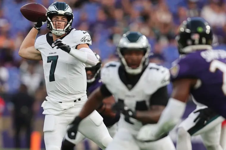 Eagles quarterback Kenny Pickett looks to throw the football during the first quarter against the Baltimore Ravens in a preseason game at M&T Bank Stadium in Baltimore on Friday, Aug. 9, 2024.