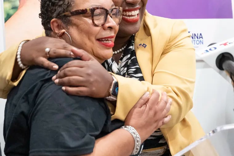 Speaker of the House Joanna E. McClinton hugs Ardella's House founder Tonie Willis (left) after announcing the reentry center had been awarded a $150,000 grant from Google.
