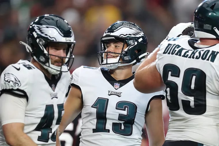 Philadelphia Eagles kicker Cameron Dicker (center) smiles after his fourth quarter field goal was good giving the Eagles a 20-17 lead over the Cardinals. Eagles win 20-17 over the Cardinals at State Farm Stadium in Glendale, Ariz. on Sunday, Oct. 9, 2022.