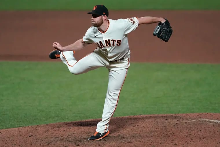 Sam Coonrod pitching for the Giants last September.