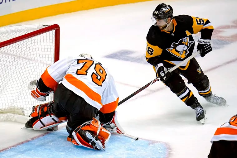 Kris Letang injured as Penguins extend winning streak to nine 